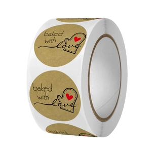Roll of kraft paper stickers with baked with love text and heart oven mitt illustration
