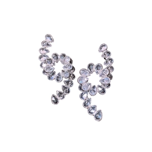 Elegant silver spiral earrings with clear zircon stones on a clean white background