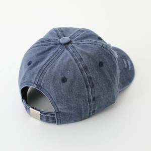 Vintage gray-blue denim baseball cap with dinosaur embroidery and metal buckle closure