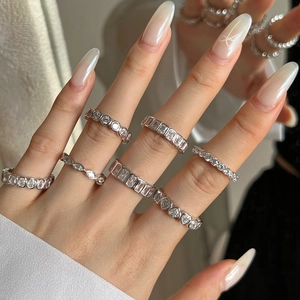 Elegant S925 sterling silver ring set for women featuring heart and geometric zircon designs