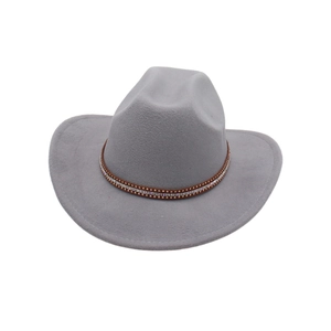 Detailed close-up of grey felt western cowboy hat with studded brown leather band