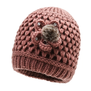 Thick warm winter knitted hat for women with floral detail and faux fur pom-pom