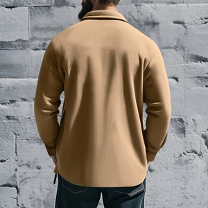 Rear view of slim fit camel jacket showing casual button-down cut and textured fabric