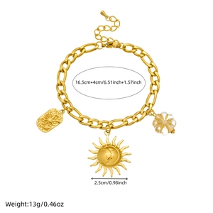 Gold stainless steel bracelet with sun pendant and flower charm on white background