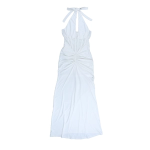 Detail of white halter neck dress featuring waist cut-out and elegant ruched fabric