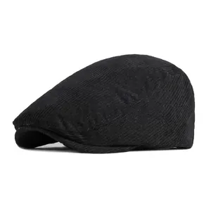 Vintage black corduroy flat cap for men and women with minimalist retro short brim design