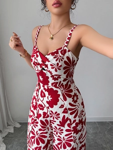 Detail of twisted knot chest design on floral print wide-leg jumpsuit for women