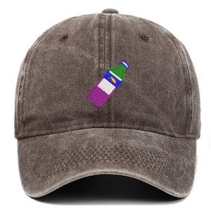 Close-up of bottle embroidery on vintage washed cotton baseball cap with curved brim