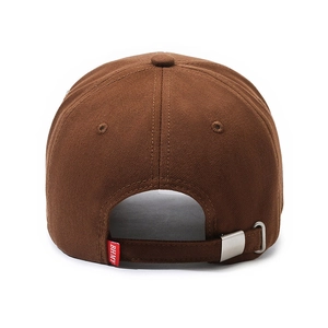 Rear view of brown cotton baseball cap showing metal adjustment buckle and red brand tag
