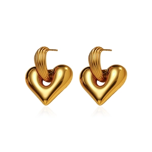 Minimalist gold heart stud earrings in polished stainless steel with high-end glossy finish