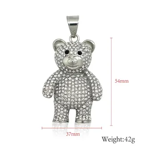Iced out teddy bear pendant in silver tone with white rhinestones, size 54x37mm