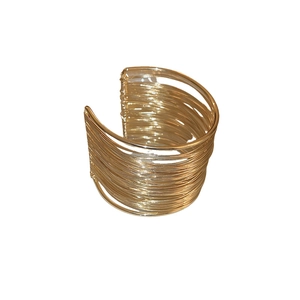 Exaggerated minimalist layered open gold arm cuff bracelet with multi-wire wrap design