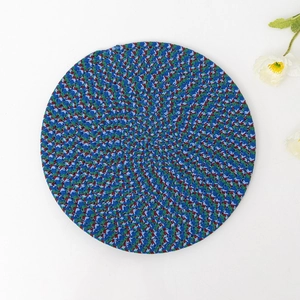 Round woven cotton heat resistant placemat in blue green and red weave pattern