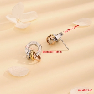 Three-tone titanium steel earrings with Roman numerals in gold, silver, and rose gold