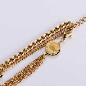 Multi-layer gold stainless steel chain bracelet featuring Queen Elizabeth coin pendant