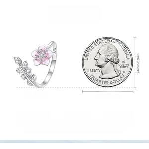 Detail view of pink enamel flower S925 silver ring with 1.9mm width and 2.2g weight