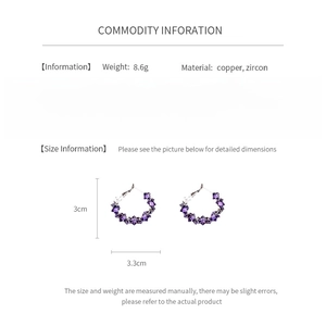 Detail view of purple zircon rhombus hoop earrings with 3cm x 3.3cm size specifications