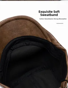 Detail view of the soft black cotton sweatband inside the brown faux leather beret hat