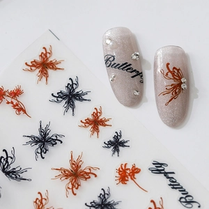 Embossed butterfly nail stickers with orange and black floral patterns for manicure art