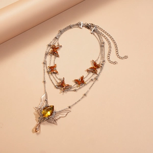Double layered necklace with orange enamel butterflies and amber gemstone pendant