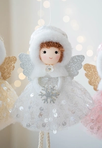 Detail of Christmas angel girl ornament with glitter wings and white tulle sequin dress