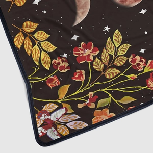 Artistic flannel blanket with moon moth and star patterns on dark brown fabric