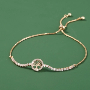 Elegant gold tree of life bracelet with micro-paved zircons and adjustable slider chain