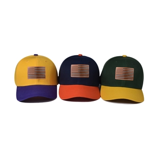Three color-block baseball caps with US flag leather patches on a white background