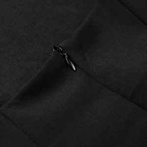 Close-up detail of the concealed invisible zipper on this black sleeveless halter dress