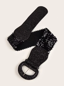 Detail of black sequin wide belt with elastic band and silver round buckle closure