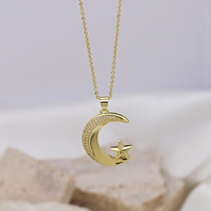 Elegant gold plated star and moon pendant necklace inlaid with cubic zirconia stones