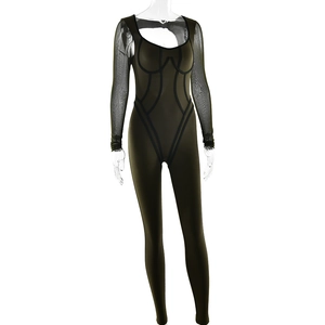 Detail of slim-fit dark green bodysuit with black mesh long sleeves and body-shaping lines