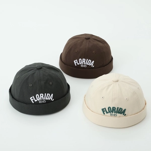 Three cotton Miki hats with Florida 1845 embroidery in green, brown and beige colors