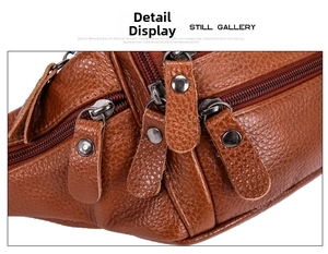 Close-up of brown lychee leather waist bag featuring multiple zipper pockets and stitching