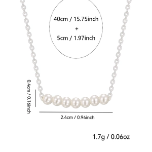 S925 sterling silver necklace featuring seven round white pearls on a minimalist bar pendant