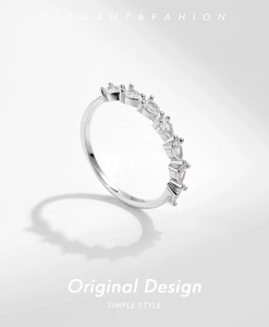Detail of S925 silver ring featuring seven pear-cut teardrop cubic zirconia stones