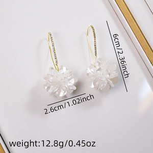 Detail view of shell flower earrings showing dimensions of 6cm length and 2.6cm width
