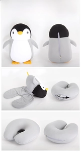 Detail of 2-in-1 penguin plush toy transforming into a U-shaped neck pillow with zipper