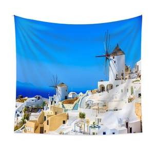 Detail of Santorini tapestry showing white windmills and blue ocean on polyester fabric