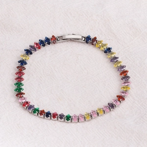 Detail of silver tennis bracelet featuring multi-color marquise-cut cubic zirconia stones