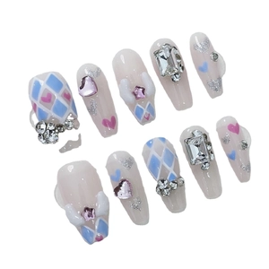 Sweet press-on nails set with 3D angel wings, pink hearts, and blue diamond crystals