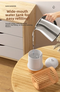 Detail of Glow Humidifier showing large opening water tank and wood grain cover