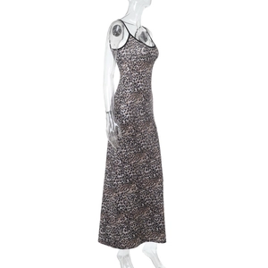 Detail of elegant leopard print maxi dress showing fabric texture and slim fit design
