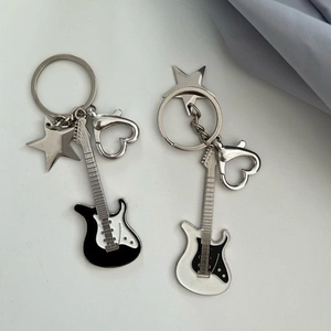 Chic electric guitar star keychains in black and white with star charms and heart clips