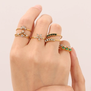 18K gold plated stainless steel rings featuring green zircon flower and V-shaped designs