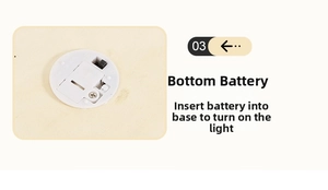 Close-up of bottom base with battery slot and toggle switch for wooden night light