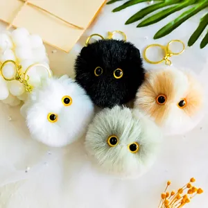 Cute plush kitten pompoms keychain set in four colors with golden metal hooks