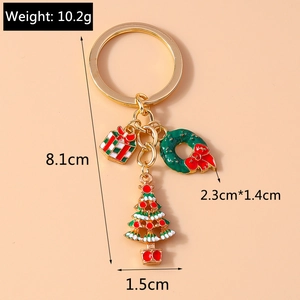 Detailed view of Christmas keychain with dimensions for gift box wreath and tree charms