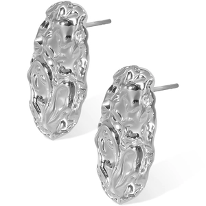 Detailed view of silver-colored stainless steel earrings with irregular lava ripple texture