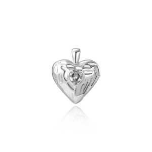 Detail of silver heart pendant with textured surface and sparkling center zircon crystal